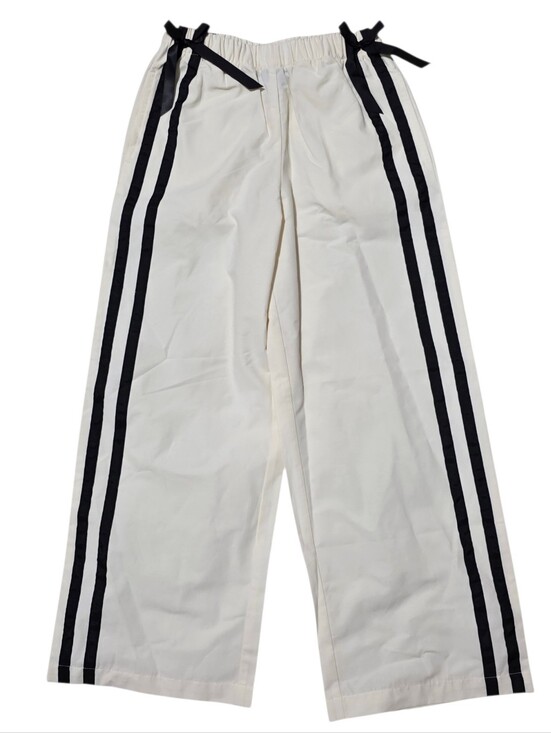 weekend academy Other - Weekend academy cream pants with black stripes with bow detail
